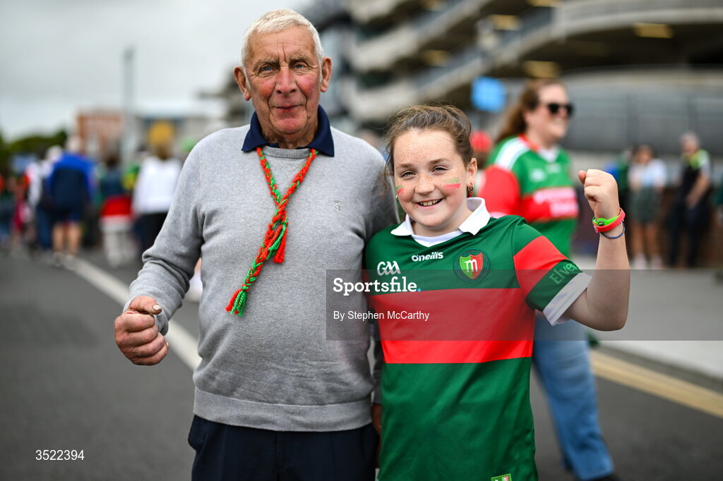 26 July 2026; Mayo supporters Michael Staunton, left, and his granddaughter Chloe Conroy, from Carnacon in Mayo, before the GAA Football All-Ireland Senior Championship final match between Kerry and Mayo at Croke Park in Dublin. Photo by Stephen McCarthy/Sportsfile