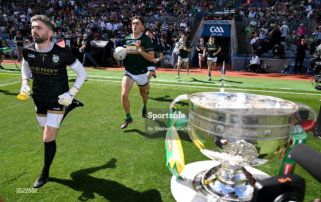 26 July 2026; Kerry players, including David Clifford, centre, run past the Sam Maguire Cup ahead of the GAA Football All-Ireland Senior Championship final match between Kerry and Mayo at Croke Park in Dublin. Photo by Stephen McCarthy/Sportsfile