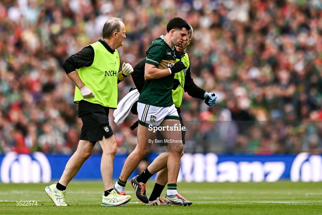 26 July 2026; Dylan Geaney of Kerry is assisted off the pitch after sustaining an injury during the GAA Football All-Ireland Senior Championship final match between Kerry and Mayo at Croke Park in Dublin. Photo by Ben McShane/Sportsfile