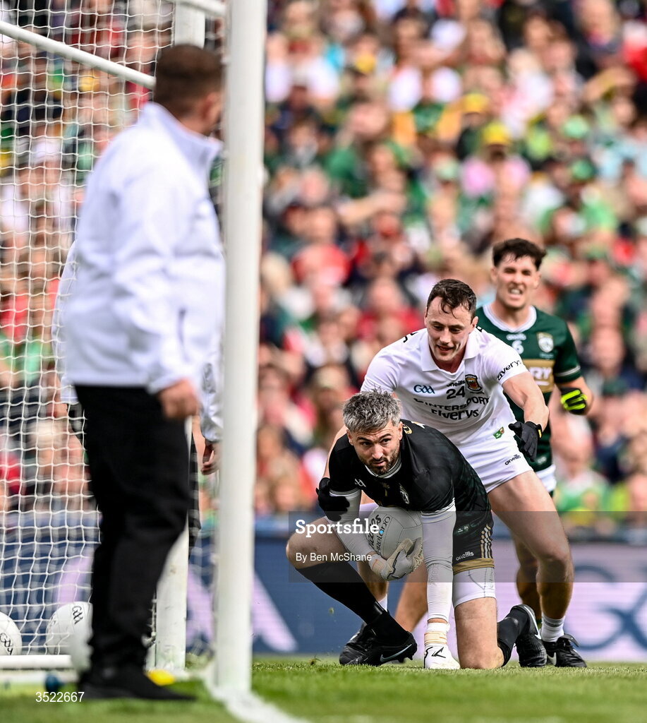 26 July 2026; Kerry goalkeeper Shane Murphy gathers possession under pressure from Diarmuid O'Connor of Mayo during the GAA Football All-Ireland Senior Championship final match between Kerry and Mayo at Croke Park in Dublin. Photo by Ben McShane/Sportsfile