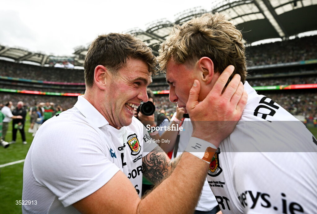 26 July 2026; Mayo players Jordan Flynn, left, and Kobe McDonald celebrate after their side's victory in the GAA Football All-Ireland Senior Championship final match between Kerry and Mayo at Croke Park in Dublin. Photo by Seb Daly/Sportsfile