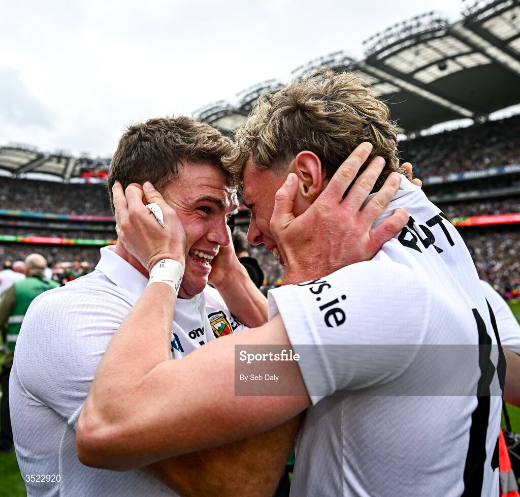 26 July 2026; Mayo players Jordan Flynn, left, and Kobe McDonald celebrate after their side's victory in the GAA Football All-Ireland Senior Championship final match between Kerry and Mayo at Croke Park in Dublin. Photo by Seb Daly/Sportsfile
