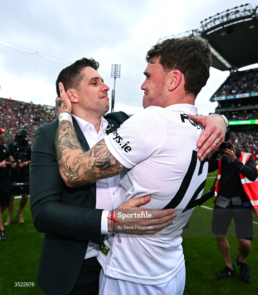 26 July 2026; Former Mayo player Lee Keegan, left, celebrates with Jordan Flynn of Mayo after the GAA Football All-Ireland Senior Championship final match between Kerry and Mayo at Croke Park in Dublin. Photo by David Fitzgerald/Sportsfile