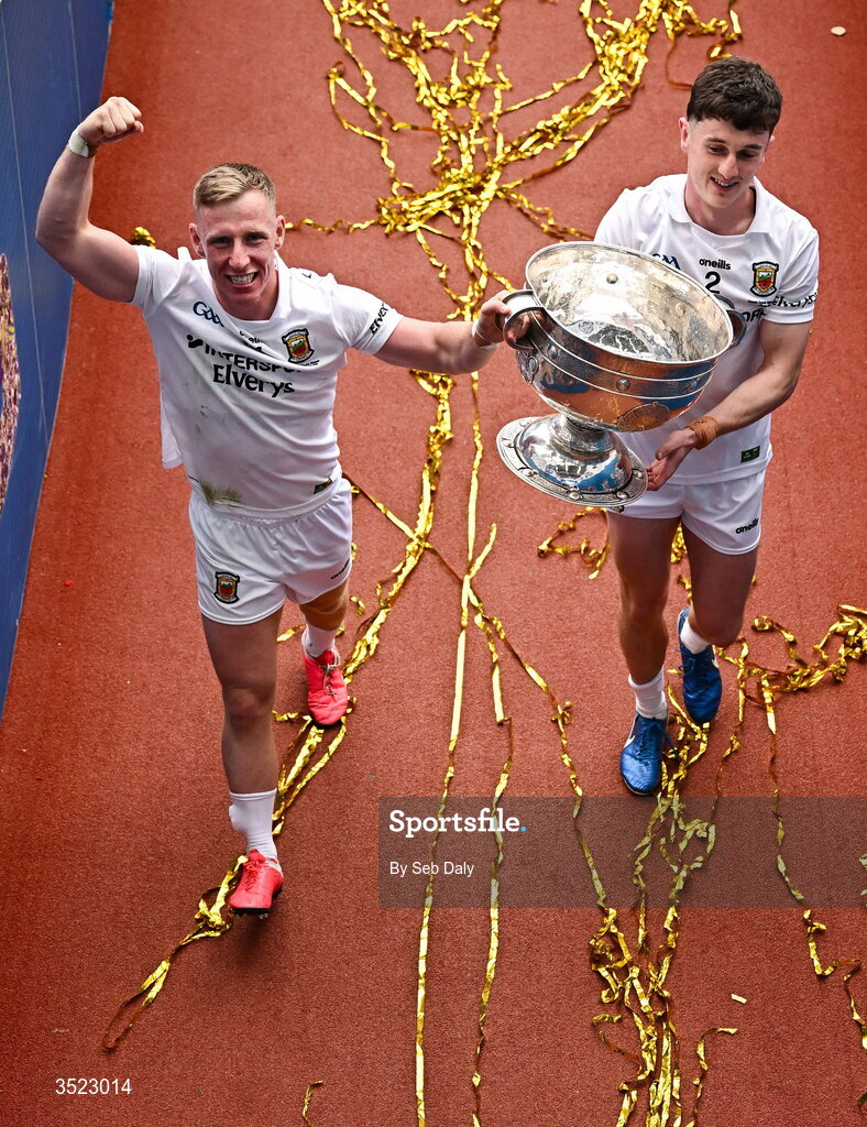 26 July 2026; Mayo players Ryan O'Donoghue, left, and Jack Coyne carry the Sam Maguire Cup down the tunnel after the GAA Football All-Ireland Senior Championship final match between Kerry and Mayo at Croke Park in Dublin. Photo by Seb Daly/Sportsfile