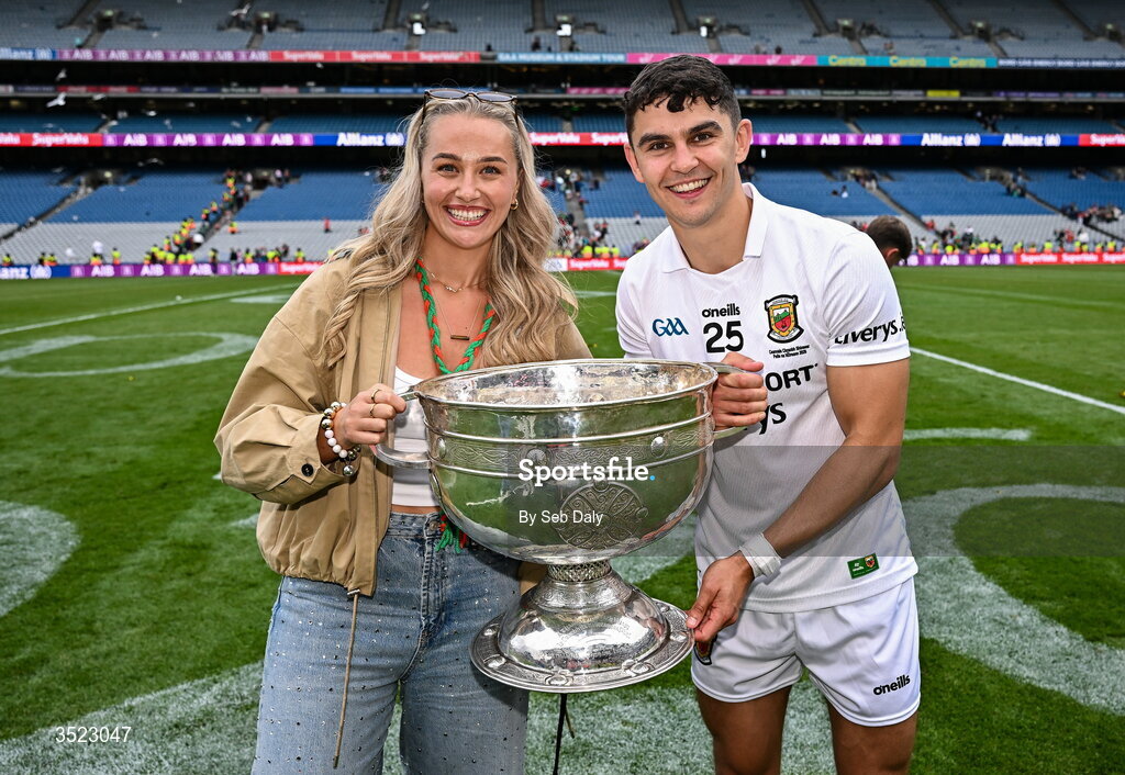 26 July 2026; Tommy Conroy of Mayo with his partner Muireann Egan and the Sam Maguire Cup after the GAA Football All-Ireland Senior Championship final match between Kerry and Mayo at Croke Park in Dublin. Photo by Seb Daly/Sportsfile