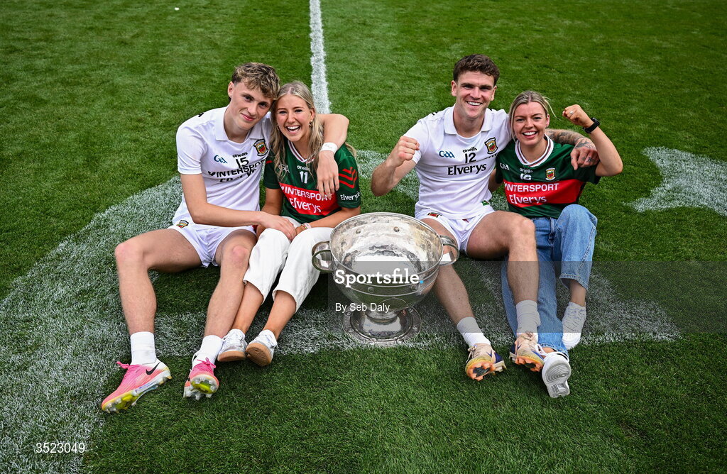 26 July 2026; Mayo players Kobe McDonald, left, and Jordan Flynn with their partners Leah Meheady, second from left, and Jessie Brown, after the GAA Football All-Ireland Senior Championship final match between Kerry and Mayo at Croke Park in Dublin. Photo by Seb Daly/Sportsfile
