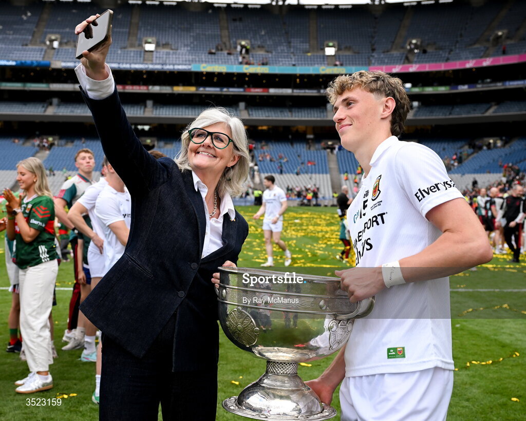26 July 2026; The Governer General of Australia, Sam Mostryn, takes a selfie with Kobe McDonald of Mayo  who is holding the Sam Maguire after the GAA Football All-Ireland Senior Championship final match between Kerry and Mayo at Croke Park in Dublin. Photo by Ray McManus/Sportsfile