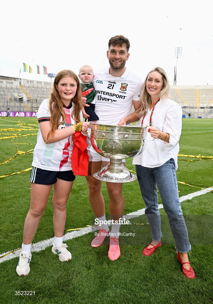 26 July 2026; Aidan O'Shea of Mayo celebrates with his daughters Caragh, Romee and wife Kristin and the Sam Maguire Cup following the GAA Football All-Ireland Senior Championship final match between Kerry and Mayo at Croke Park in Dublin. Photo by Stephen McCarthy/Sportsfile