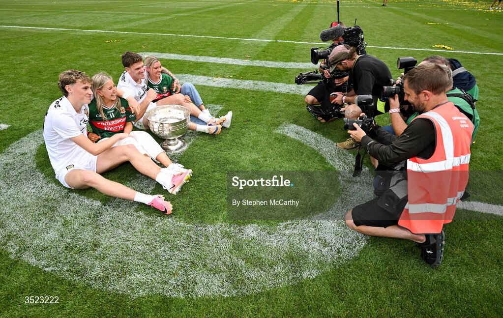 26 July 2026; Mayo players Kobe McDonald, left, and Jordan Flynn with their partners Leah Meheady, second from left, and Jessie Brown, following the GAA Football All-Ireland Senior Championship final match between Kerry and Mayo at Croke Park in Dublin. Photo by Stephen McCarthy/Sportsfile