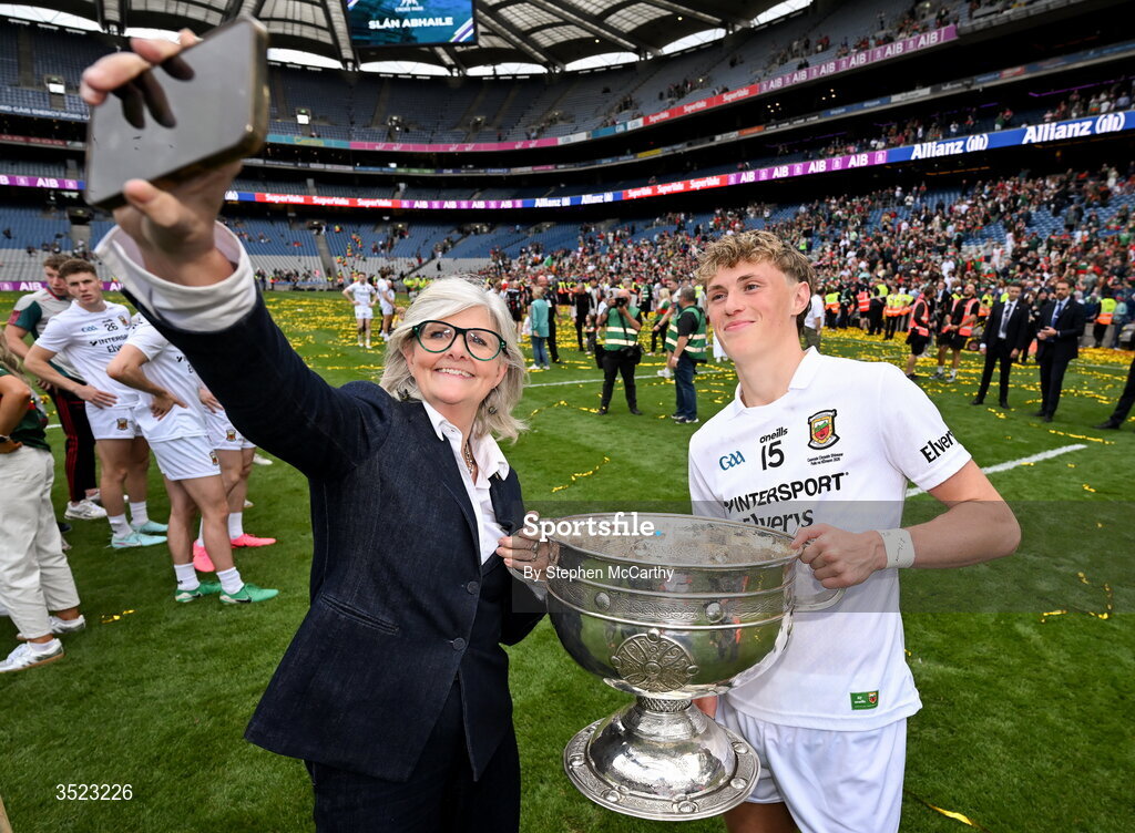 26 July 2026; Kobe McDonald of Mayo with Sam Mostyn, Governor-General of Australia, and the Sam Maguire Cup after the GAA Football All-Ireland Senior Championship final match between Kerry and Mayo at Croke Park in Dublin. Photo by Stephen McCarthy/Sportsfile