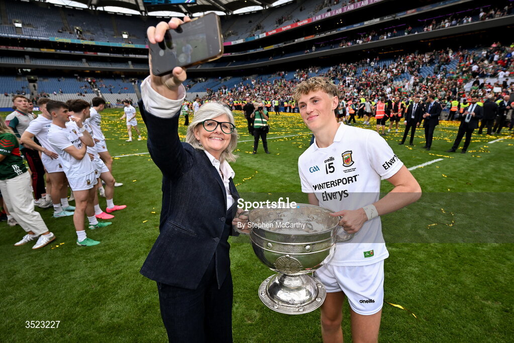 26 July 2026; Kobe McDonald of Mayo with Sam Mostyn, Governor-General of Australia, and the Sam Maguire Cup after the GAA Football All-Ireland Senior Championship final match between Kerry and Mayo at Croke Park in Dublin. Photo by Stephen McCarthy/Sportsfile