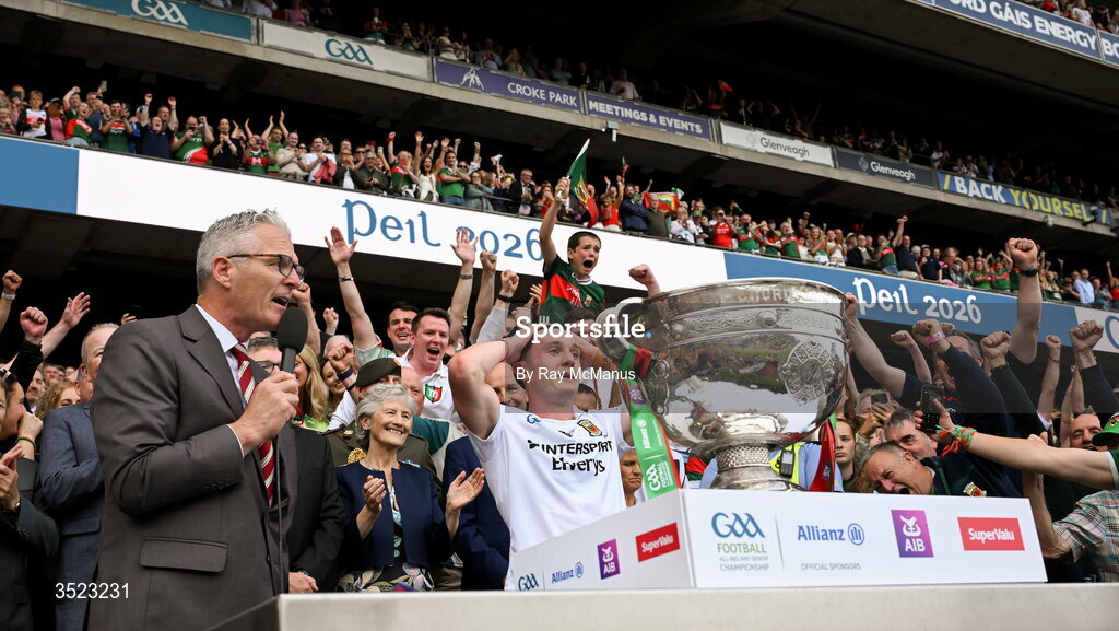 26 July 2026; Uachtarán Chumann Lúthchleas Gael Jarlath Burns speaks before presenting Mayo captain Jack Coyne with the Sam Maguire after the GAA Football All-Ireland Senior Championship final match between Kerry and Mayo at Croke Park in Dublin. Photo by Ray McManus/Sportsfile