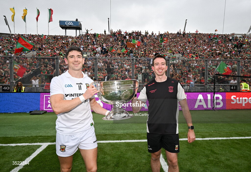 26 July 2026; Mayo's Conor Loftus, left, and nutritionist Evan Regan celebrate with the Sam Maguire Cup following the GAA Football All-Ireland Senior Championship final match between Kerry and Mayo at Croke Park in Dublin. Photo by Stephen McCarthy/Sportsfile