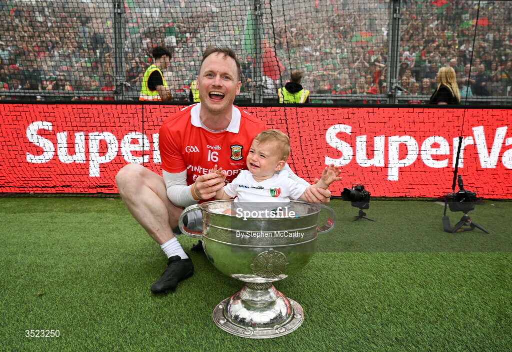26 July 2026; Mayo goalkeeper Rob Hennelly and his son Billy celebrate with the Sam Maguire Cup following the GAA Football All-Ireland Senior Championship final match between Kerry and Mayo at Croke Park in Dublin. Photo by Stephen McCarthy/Sportsfile