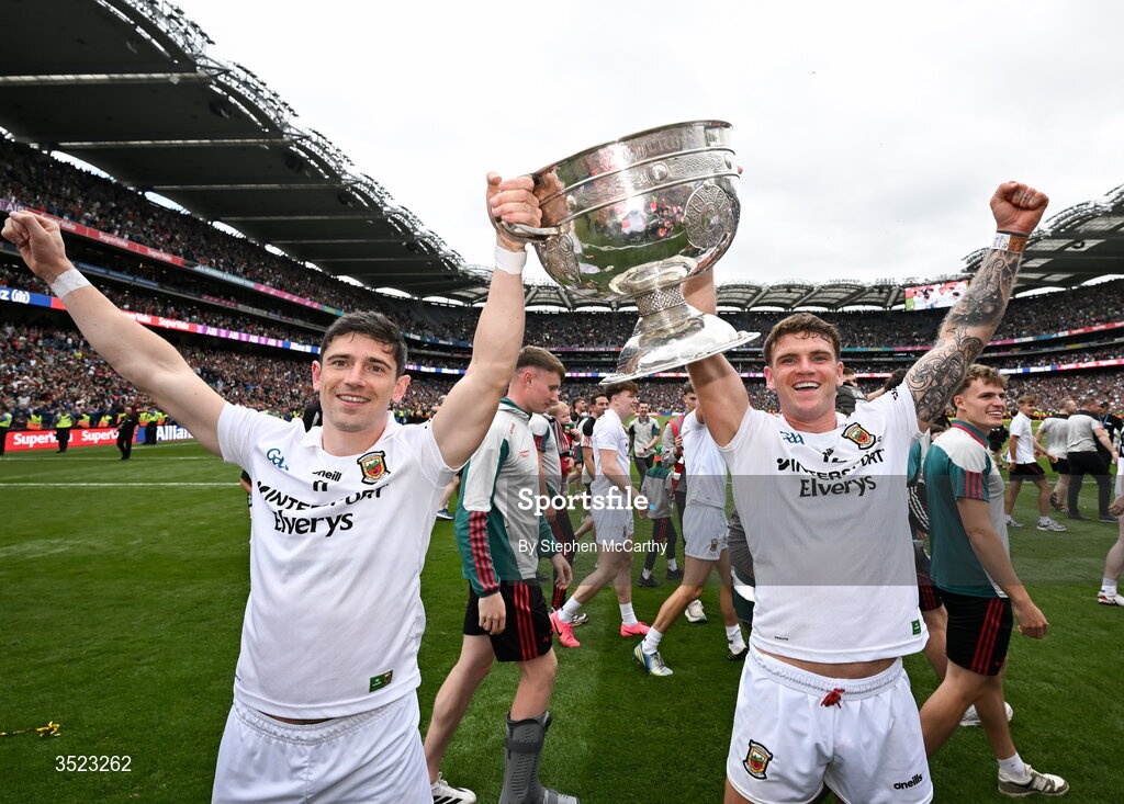 26 July 2026; Conor Loftus, left, and Jordan Flynn of Mayo celebrate with the Sam Maguire cup after the GAA Football All-Ireland Senior Championship final match between Kerry and Mayo at Croke Park in Dublin. Photo by Stephen McCarthy/Sportsfile