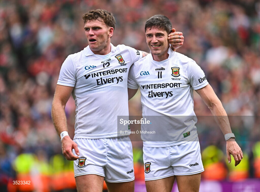 26 July 2026; Mayo players Jordan Flynn, left, and Conor Loftus celebrate after the GAA Football All-Ireland Senior Championship final match between Kerry and Mayo at Croke Park in Dublin. Photo by Piaras Ó Mídheach/Sportsfile