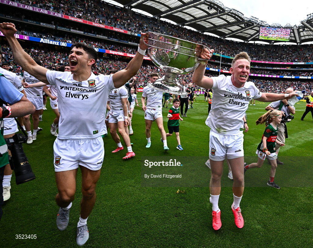 26 July 2026; Tommy Conroy, left, and Ryan O'Donoghue of Mayo celebrate with the Sam Maguire cup after the GAA Football All-Ireland Senior Championship final match between Kerry and Mayo at Croke Park in Dublin. Photo by David Fitzgerald/Sportsfile