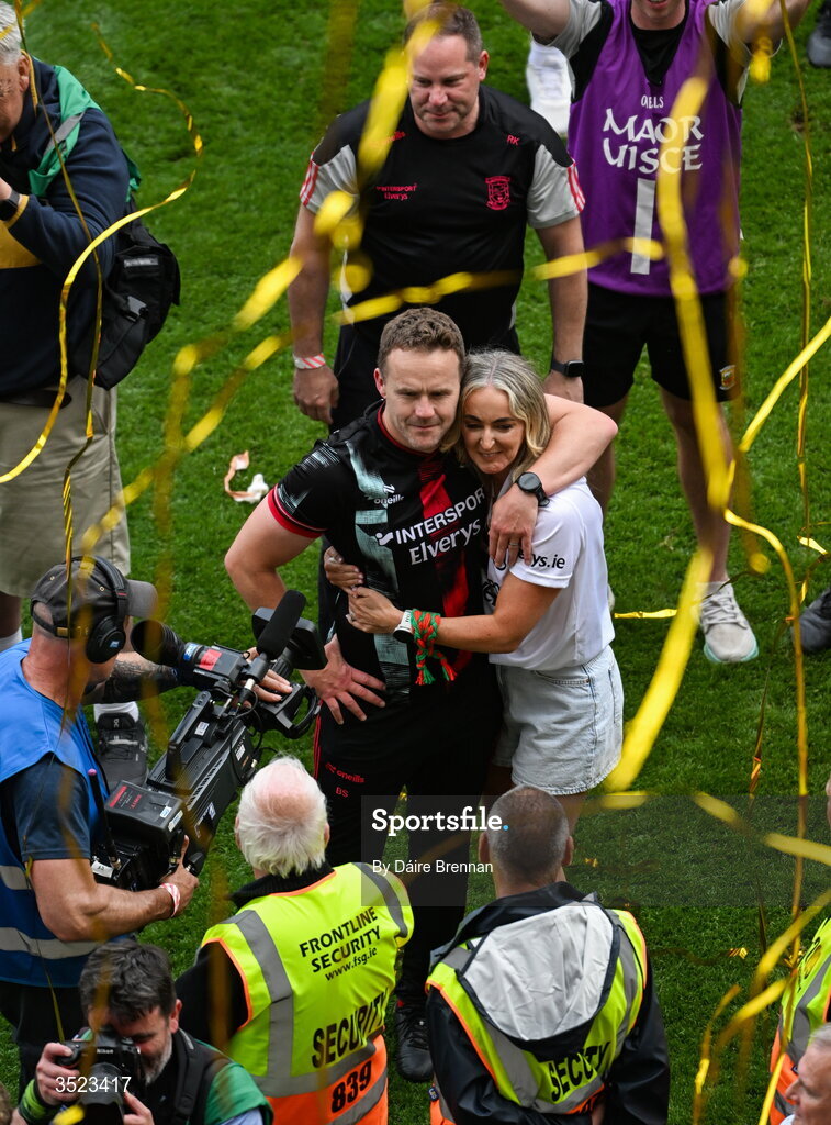 26 July 2026; Mayo manager Andy Moran and his wife Jennifer watch the presentation after the GAA Football All-Ireland Senior Championship final match between Kerry and Mayo at Croke Park in Dublin. Photo by Dáire Brennan/Sportsfile Photo by Daire Brennan/Sportsfile