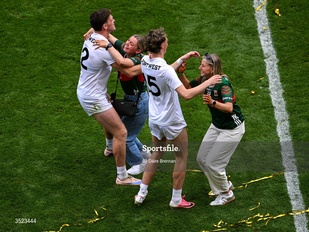26 July 2026; Jordan Flynn, left, and Kobe McDonald of Mayo celebrate with their partners, Leah Maheady, right, and Jessie Brown, after the GAA Football All-Ireland Senior Championship final match between Kerry and Mayo at Croke Park in Dublin. Photo by Dáire Brennan/Sportsfile Photo by Daire Brennan/Sportsfile