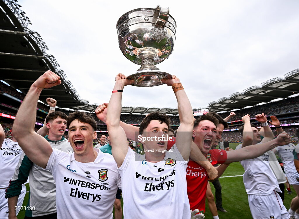 26 July 2026; Mayo captain Jack Coyne, centre, and team mates celebrate with the cup after the GAA Football All-Ireland Senior Championship final match between Kerry and Mayo at Croke Park in Dublin. Photo by David Fitzgerald/Sportsfile