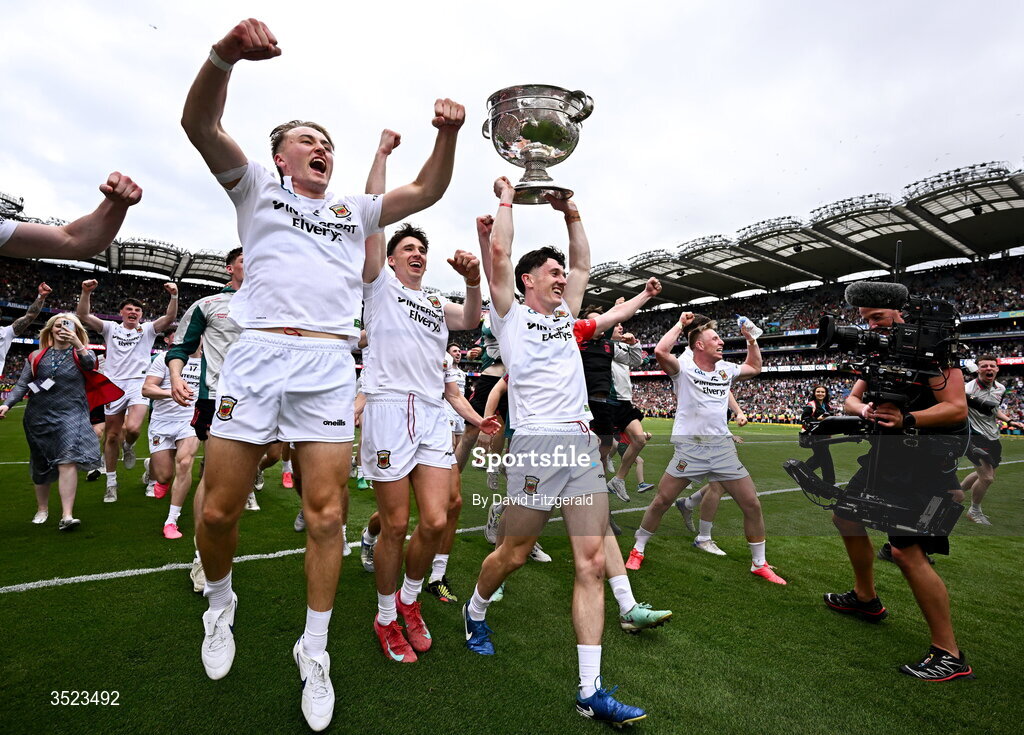 26 July 2026; Mayo captain Jack Coyne, centre, and team mates celebrate with the cup after the GAA Football All-Ireland Senior Championship final match between Kerry and Mayo at Croke Park in Dublin. Photo by David Fitzgerald/Sportsfile