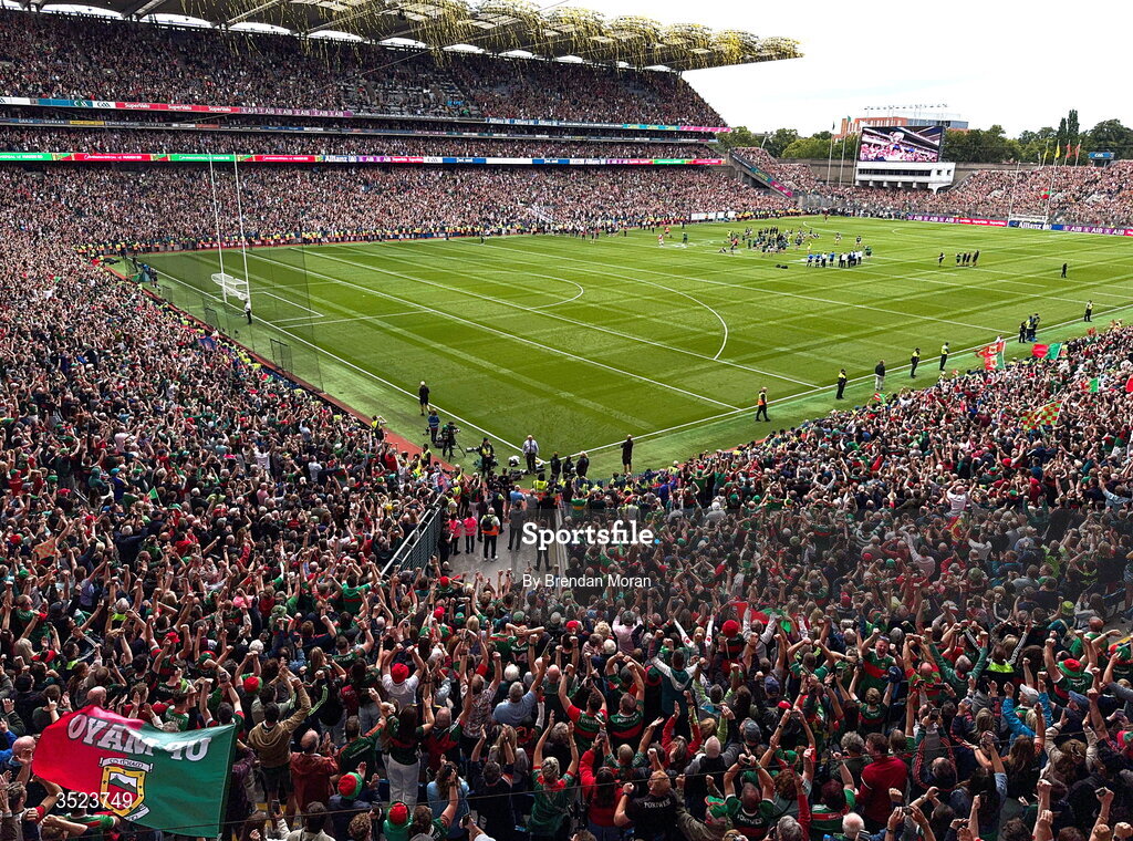 26 July 2026; (EDITOR'S NOTE; Image taken with a smartphone) Supporters from both sides remain in the stands as Mayo suporters cheer while Mayo captain Jack Coyne lifts the Sam Maguire Cup after his side's victory in the GAA Football All-Ireland Senior Championship final match between Kerry and Mayo at Croke Park in Dublin. Photo by Brendan Moran/Sportsfile