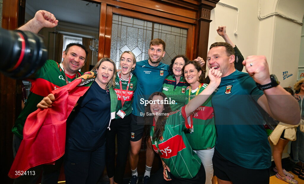 27 July 2026; Aidan O'Shea of Mayo, centre, and Mayo manager Andy Moran, right, with supporters at CHI Temple Street in Dublin after being crowned All-Ireland Senior Football champions following their victory over Kerry in the GAA All-Ireland Senior Football Championship final at Croke Park on Sunday. Photo by Sam Barnes/Sportsfile