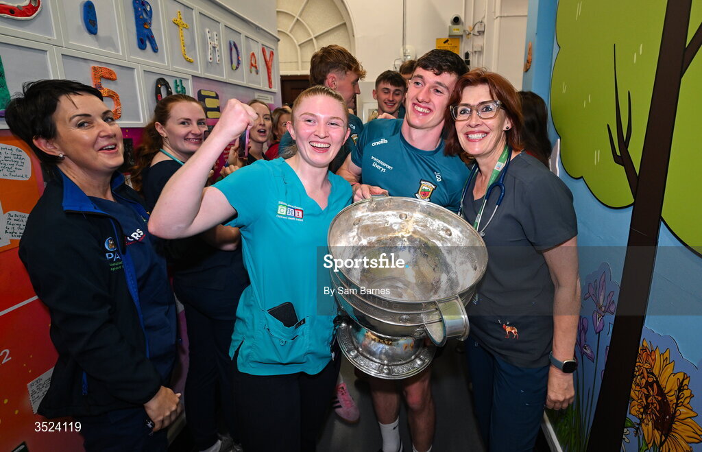 27 July 2026; Jack Coyne of Mayo celebrates with staff at the CHI Temple Street in Dublin after being crowned All-Ireland Senior Football champions following their victory over Kerry in the GAA All-Ireland Senior Football Championship final at Croke Park on Sunday. Photo by Sam Barnes/Sportsfile