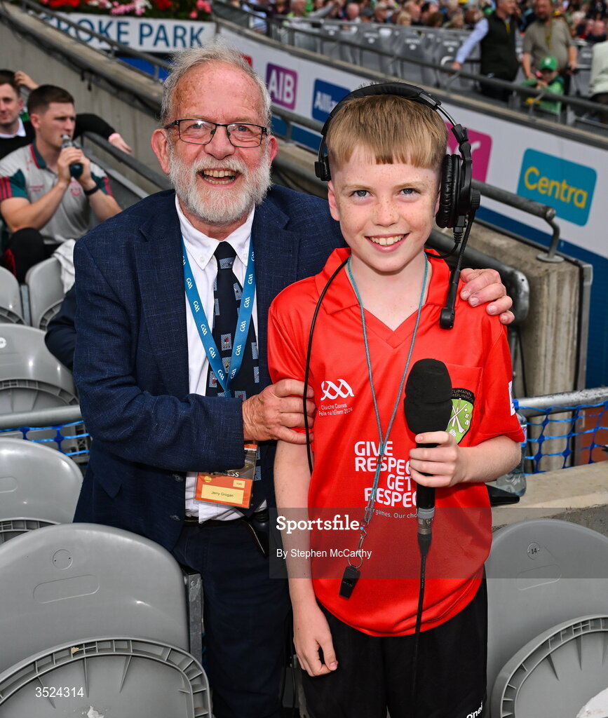 26 July 2026; Darragh Ó Raifeartaigh, Gaelscoil Bhrian Bóroimhe, Sord, Baile Átha Cliath, with stadium MC Jerry Grogan before presenting the match ball during the GAA Football All-Ireland Senior Championship final match between Kerry and Mayo at Croke Park in Dublin. Photo by Stephen McCarthy/Sportsfile