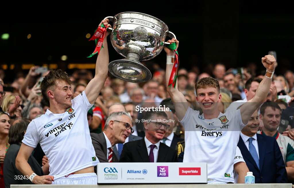 26 July 2026; Donnacha McHugh, left, and Stephen Coen of Mayo lift the Sam Maguire Cup following the GAA Football All-Ireland Senior Championship final match between Kerry and Mayo at Croke Park in Dublin. Photo by Stephen McCarthy/Sportsfile