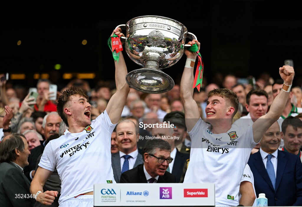26 July 2026; Donnacha McHugh, left, and Stephen Coen of Mayo lift the Sam Maguire Cup following the GAA Football All-Ireland Senior Championship final match between Kerry and Mayo at Croke Park in Dublin. Photo by Stephen McCarthy/Sportsfile