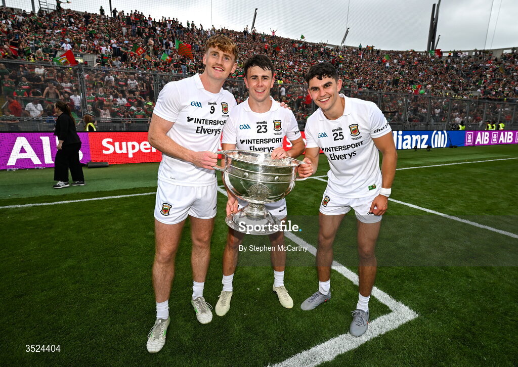 26 July 2026; Mayo players, from left, Jack Carney, Paul Towey and Tommy Conroy celebrate with the Sam Maguire Cup following the GAA Football All-Ireland Senior Championship final match between Kerry and Mayo at Croke Park in Dublin.  Photo by Stephen McCarthy/Sportsfile