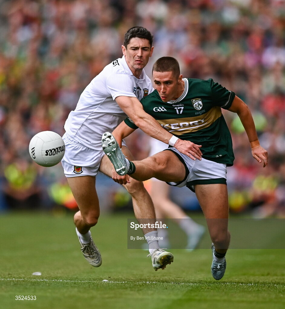 26 July 2026; Evan Looney of Kerry is tackled by Conor Loftus of Mayo during the GAA Football All-Ireland Senior Championship final match between Kerry and Mayo at Croke Park in Dublin. Photo by Ben McShane/Sportsfile