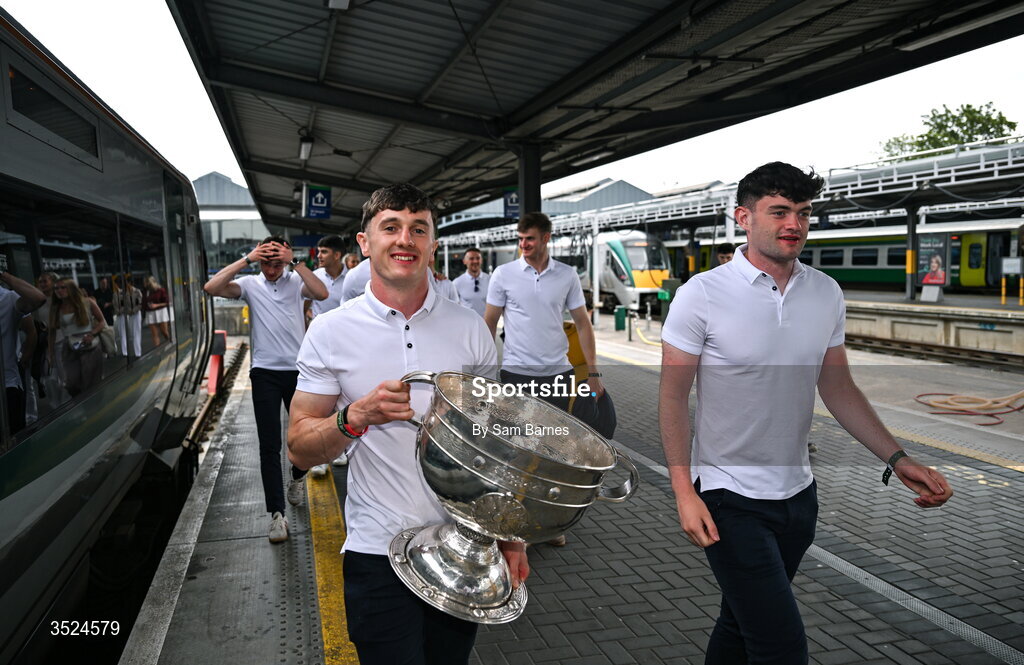 27 July 2026; Jack Coyne of Mayo, left, celebrates with the Sam Maguire Cup at Heuston Station in Dublin after being crowned All-Ireland Senior Football champions following their victory over Kerry in the GAA All-Ireland Senior Football Championship final at Croke Park on Sunday.  Photo by Sam Barnes/Sportsfile