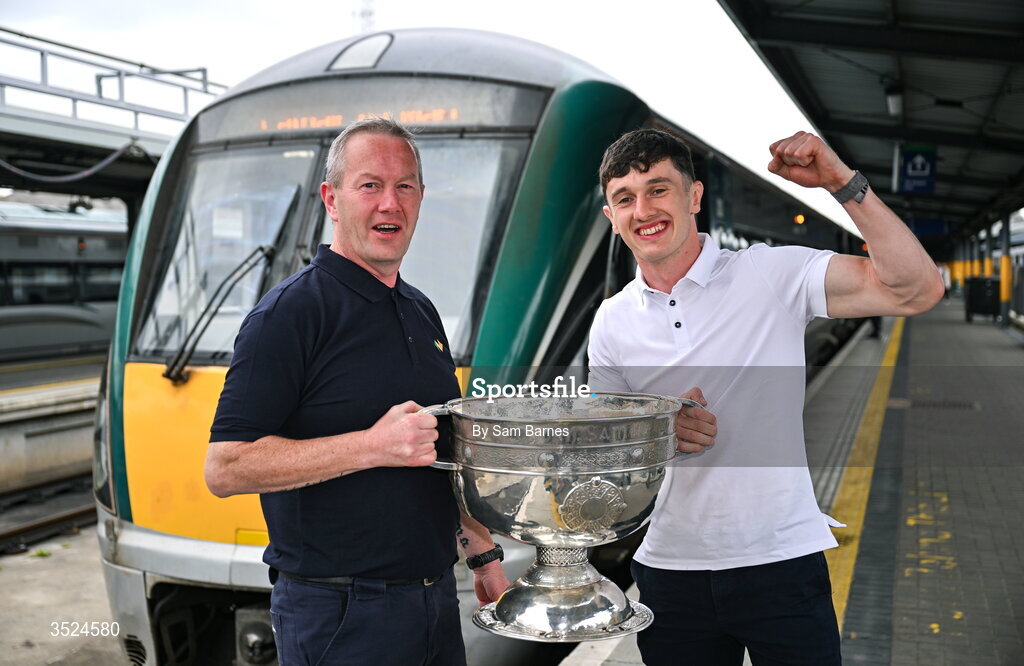 27 July 2026; Jack Coyne of Mayo and train driver Anthony O’Reardon celebrate with the Sam Maguire Cup at Heuston Station in Dublin after being crowned All-Ireland Senior Football champions following their victory over Kerry in the GAA All-Ireland Senior Football Championship final at Croke Park on Sunday.  Photo by Sam Barnes/Sportsfile
