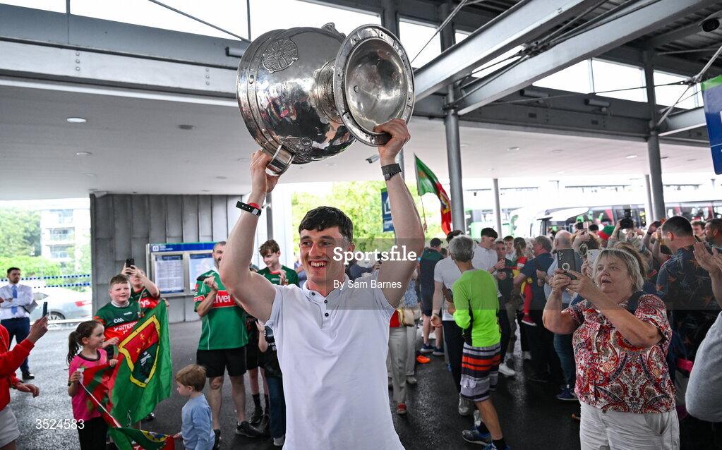 27 July 2026; Jack Coyne of Mayo celebrates with the Sam Maguire Cup at Heuston Station in Dublin after being crowned All-Ireland Senior Football champions following their victory over Kerry in the GAA All-Ireland Senior Football Championship final at Croke Park on Sunday. Photo by Sam Barnes/Sportsfile
