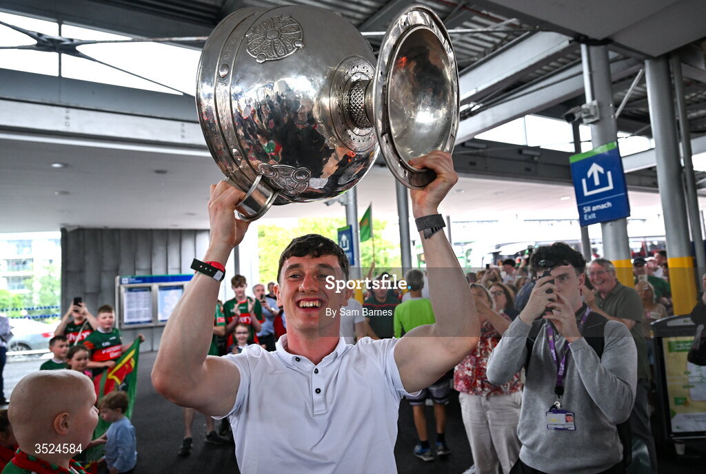 27 July 2026; Jack Coyne of Mayo celebrates with the Sam Maguire Cup at Heuston Station in Dublin after being crowned All-Ireland Senior Football champions following their victory over Kerry in the GAA All-Ireland Senior Football Championship final at Croke Park on Sunday. Photo by Sam Barnes/Sportsfile