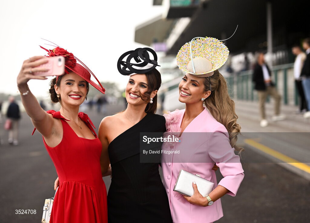 27 July 2026; Racegoers, from left, Jennifer Sharkey, Leona Morelli and Pam Richardson from Galway prior to racing during day one of the Galway Races Summer Festival at Ballybrit Racecourse in Galway. Photo by David Fitzgerald/Sportsfile