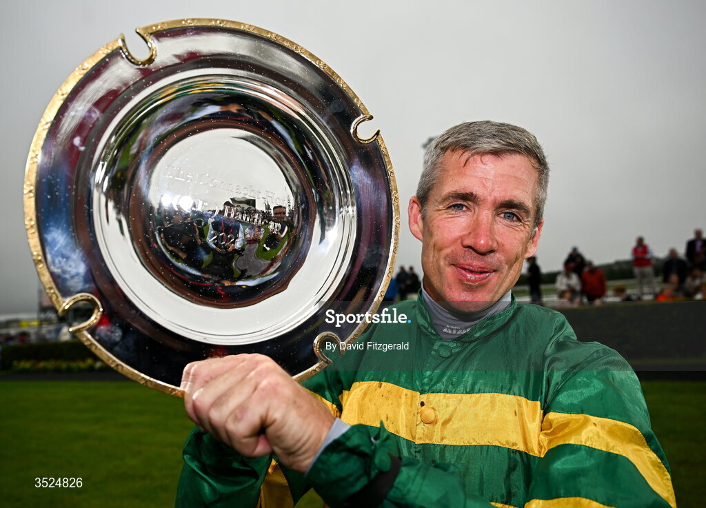 27 July 2026; Jockey Derek O'Connor celebrates with the shield after winning the Connacht Hotel Handicap onboard Comfort Zone during day one of the Galway Races Summer Festival at Ballybrit Racecourse in Galway. Photo by David Fitzgerald/Sportsfile