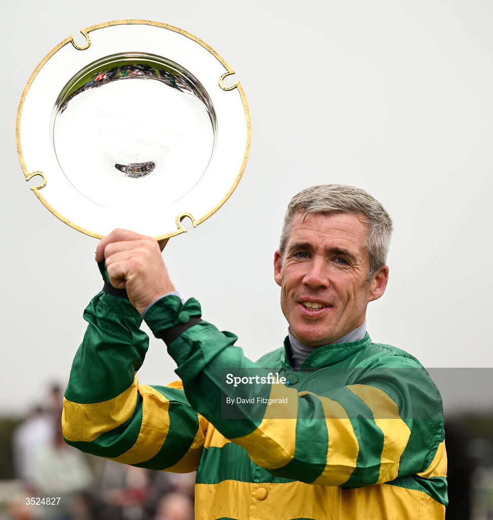27 July 2026; Jockey Derek O'Connor celebrates with the shield after winning the Connacht Hotel Handicap onboard Comfort Zone during day one of the Galway Races Summer Festival at Ballybrit Racecourse in Galway. Photo by David Fitzgerald/Sportsfile