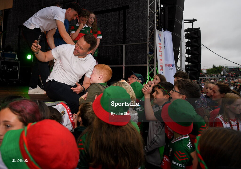 27 July 2026; Mayo manager Andy Moran spends time with young Mayo supporters during the homecoming at Castlebar in Mayo, after being crowned All-Ireland Senior Football champions following their victory over Kerry in the GAA All-Ireland Senior Football Championship final at Croke Park on Sunday. Photo by John Sheridan/Sportsfile