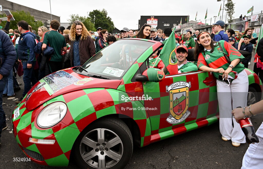 27 July 2026; Mayo supporters arrive in a car painted with the Mayo colours and flag before the homecoming celebrations of the All-Ireland Senior Football Champions at Hastings Insurance MacHale Park in Castlebar, Mayo. Photo by Piaras Ó Mídheach/Sportsfile