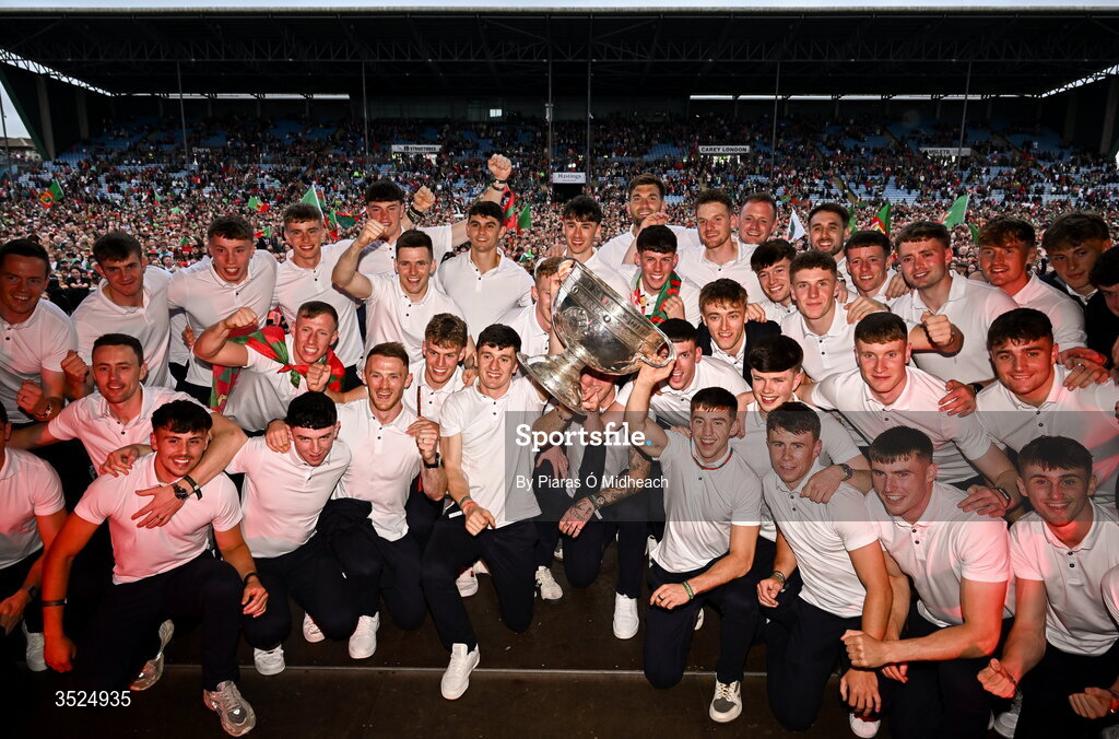 27 July 2026; The Mayo squad pose with the Sam Maguire cup in front of supporters during the homecoming celebrations of the All-Ireland Senior Football Champions at Hastings Insurance MacHale Park in Castlebar, Mayo. Photo by Piaras Ó Mídheach/Sportsfile