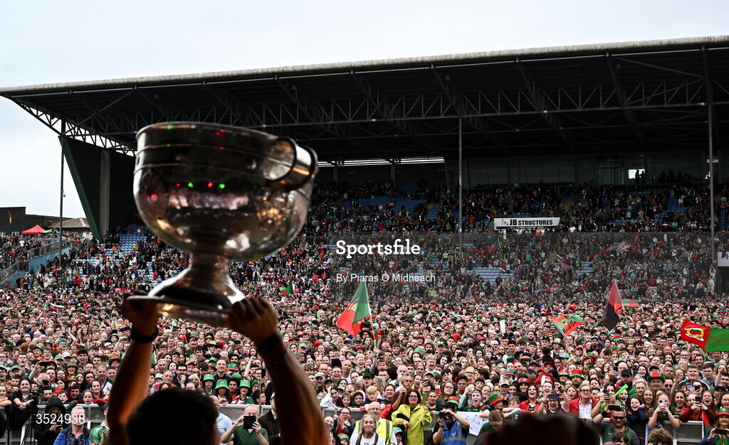 27 July 2026; Mayo supporters celebrate as the Sam Maguire Cup is held aloft during the homecoming celebrations of the All-Ireland Senior Football Champions at Hastings Insurance MacHale Park in Castlebar, Mayo. Photo by Piaras Ó Mídheach/Sportsfile