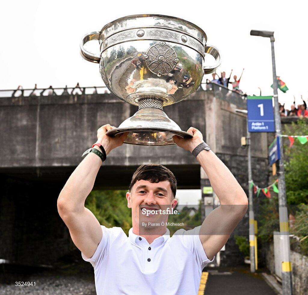 27 July 2026; Mayo captain Jack Coyne celebrates with the Sam Maguire Cup at Castlebar train station during the homecoming celebrations of the All-Ireland Senior Football Champions at Hastings Insurance MacHale Park in Castlebar, Mayo. Photo by Piaras Ó Mídheach/Sportsfile
