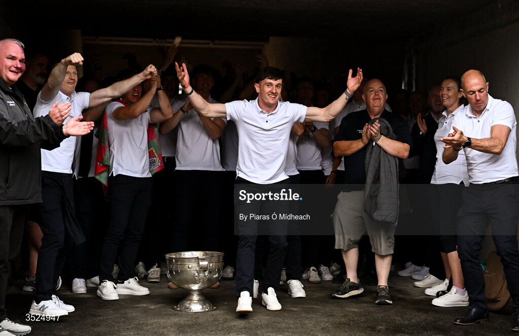 27 July 2026; Mayo captain Jack Coyne, centre, and teammates celebrate with the Sam Maguire Cup during the homecoming celebrations of the All-Ireland Senior Football Champions at Hastings Insurance MacHale Park in Castlebar, Mayo. Photo by Piaras Ó Mídheach/Sportsfile