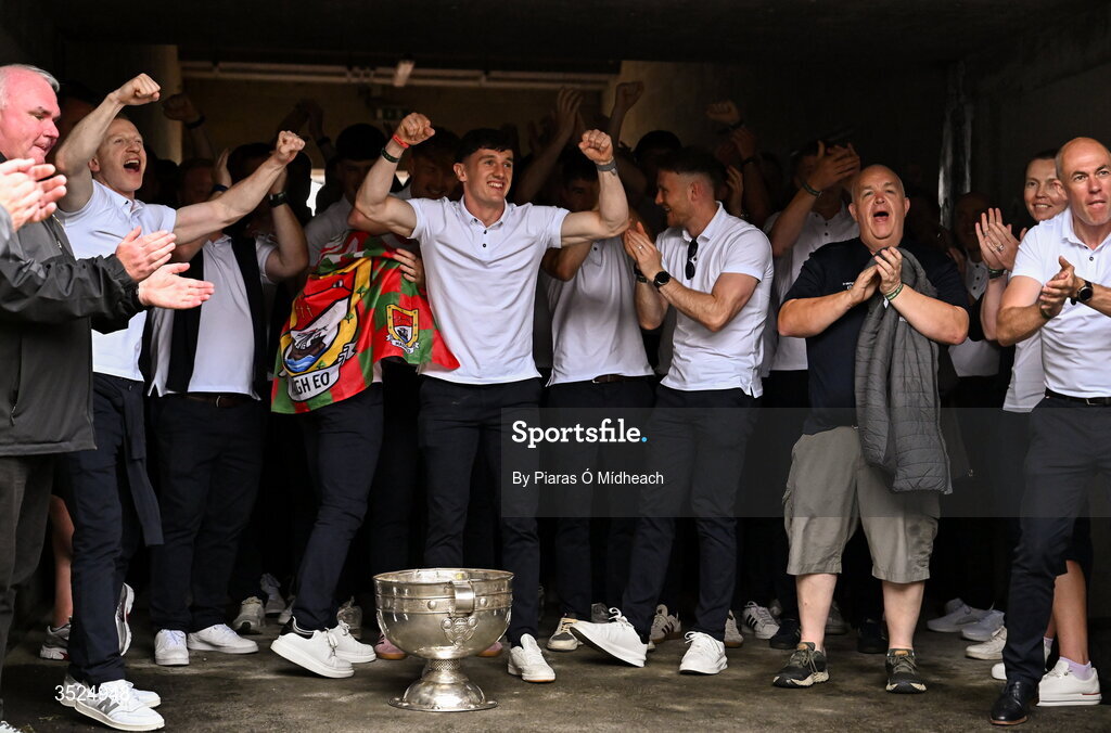 27 July 2026; Mayo captain Jack Coyne, centre, and teammates celebrate with the Sam Maguire Cup during the homecoming celebrations of the All-Ireland Senior Football Champions at Hastings Insurance MacHale Park in Castlebar, Mayo. Photo by Piaras Ó Mídheach/Sportsfile