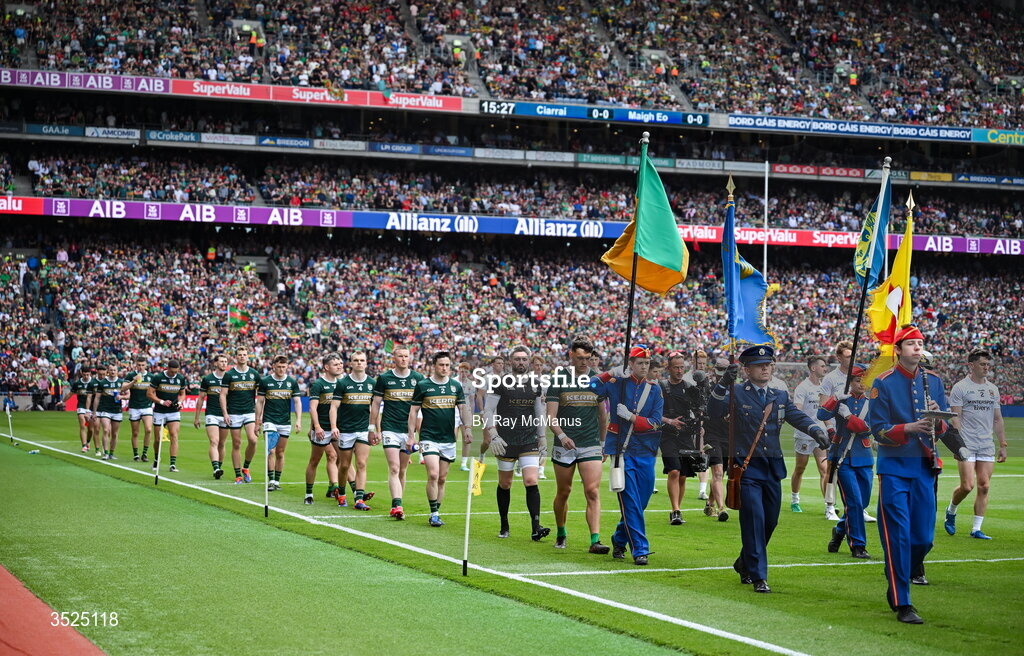 26 July 2026; The Kerry captain Dylan Geaney and Mayo captain Jack Coyne lead their teams behind the Artane Band during the parade in advance of the GAA Football All-Ireland Senior Championship final match between Kerry and Mayo at Croke Park in Dublin. Photo by Ray McManus/Sportsfile