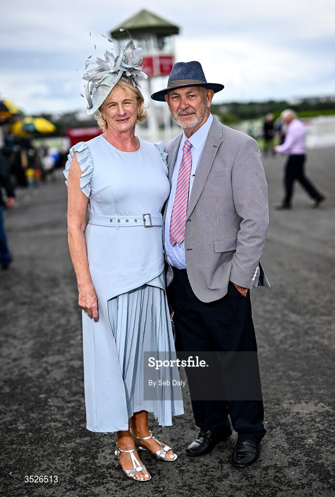 29 July 2026; Racegoers Russell Orpen, from Valentia Island, Kerry, and Della Monahan, from Lough Rea, Galway, during day three of the Galway Races Summer Festival at Ballybrit Racecourse in Galway. Photo by Seb Daly/Sportsfile