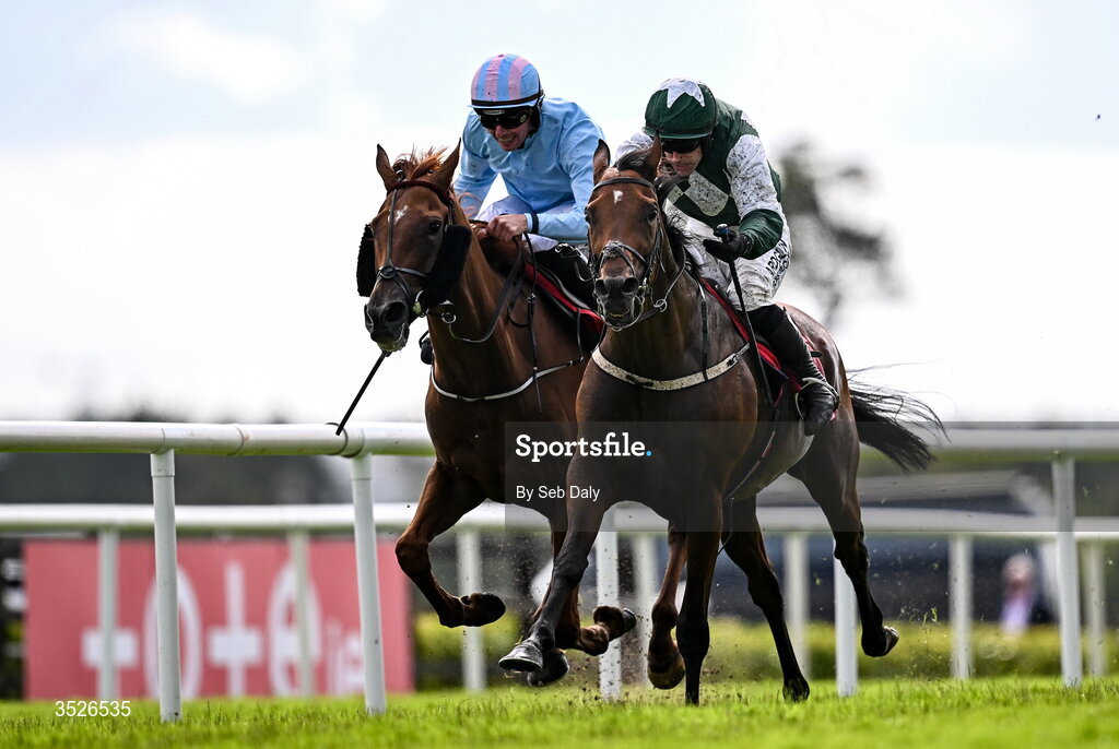 29 July 2026; Mr Hollywood, right, with Brian Hayes up, on their way to winning the Tote Maiden Hurdle, from second place Jeroboam Machin, left, with Donagh Meyler up, during day three of the Galway Races Summer Festival at Ballybrit Racecourse in Galway. Photo by Seb Daly/Sportsfile